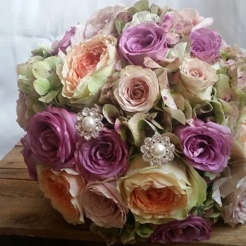 Vintage style hand tied bridal bouquets of antique Hydrangea and blush peach - Wedding flowers by Rhiann. Stoke on Trent, Staffordshire
