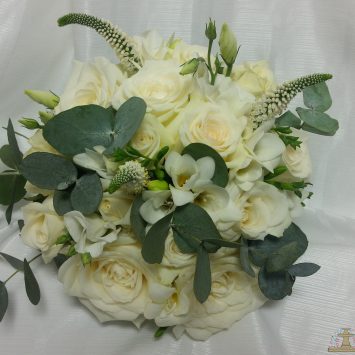 Hand tied bridal wedding bouquet of Avalanche roses, white Freesia - Wedding flowers by Rhiann. Stoke on Trent, Staffordshire